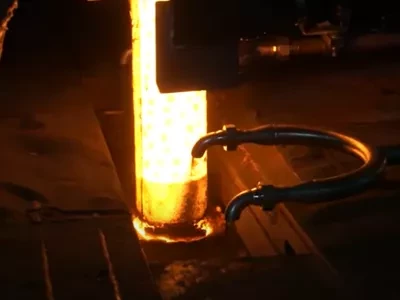 Steel casting fluxes being introduced into the mold