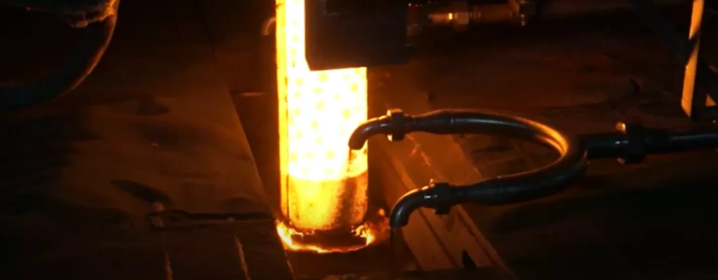 Steel casting fluxes being introduced into the mold